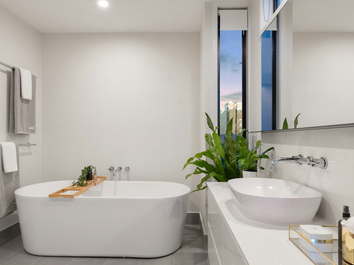 Modern bathroom remodel with clean tile and updated fixtures
