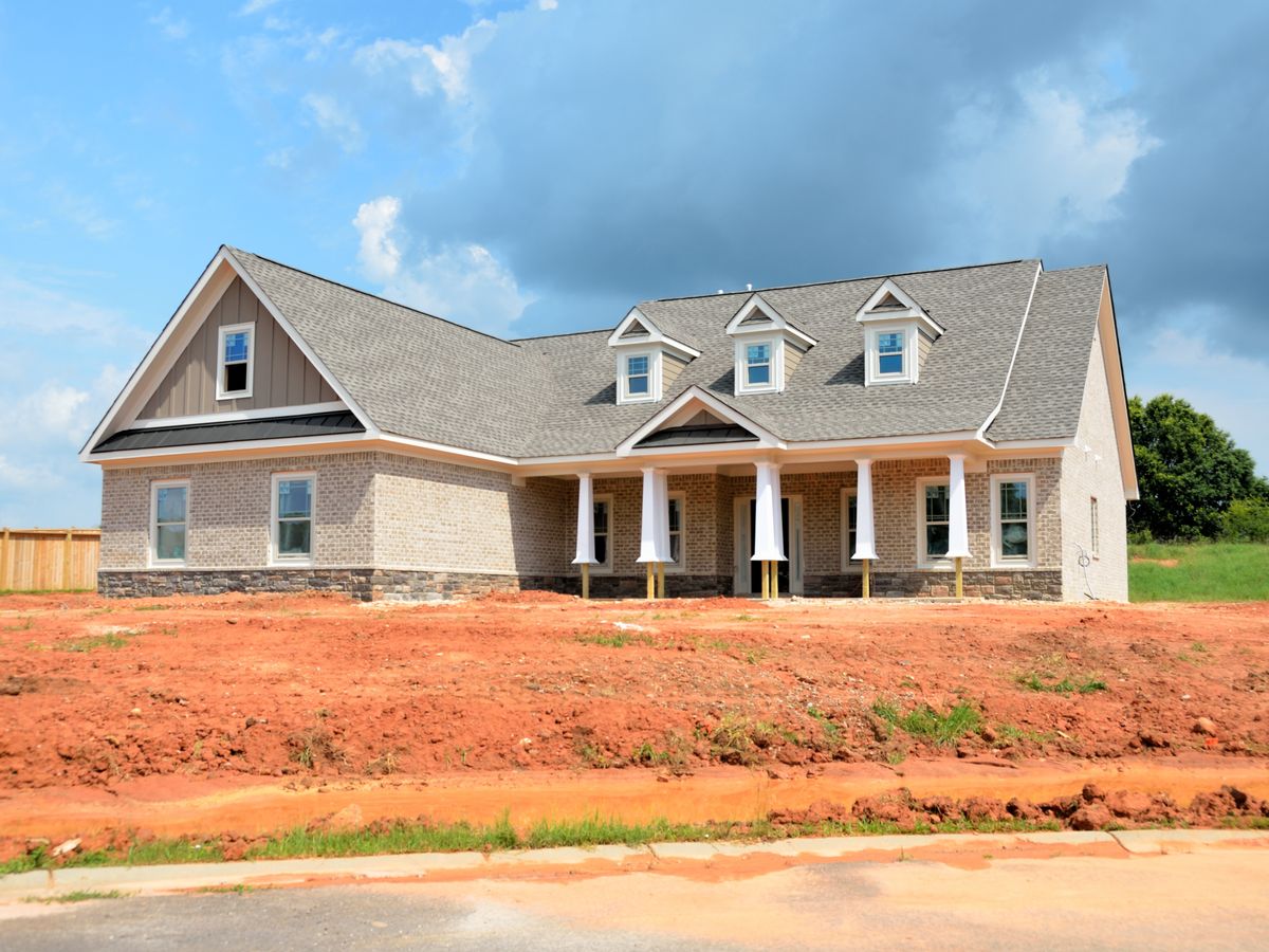 Home under construction with newly installed architectural shingles