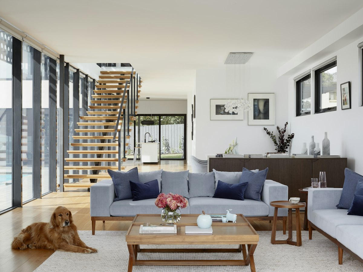 Contemporary home interior featuring floor-to-ceiling window walls